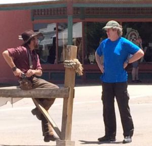 Tombstone main street: The unarmed Man from Nature in blue (me) and The Cowboy going for the draw of his 450! That guy does point blank shots to his chest with a 450 on a bullet proof vest 3 times a day! Photo thanks to Bob!