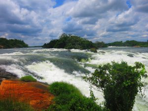 The magnificent White Nile leaving Lake Victoria. This is virtually the last natural rapid left. Hydroelectric Power taking priority of Pristine Nature. Too many people, too much consumption, or did Nature have a failing, than man's ingenuity solved? 