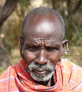 Even he is worried about The Western world... A wise old Masai man just near Kilimanjaro 2007
